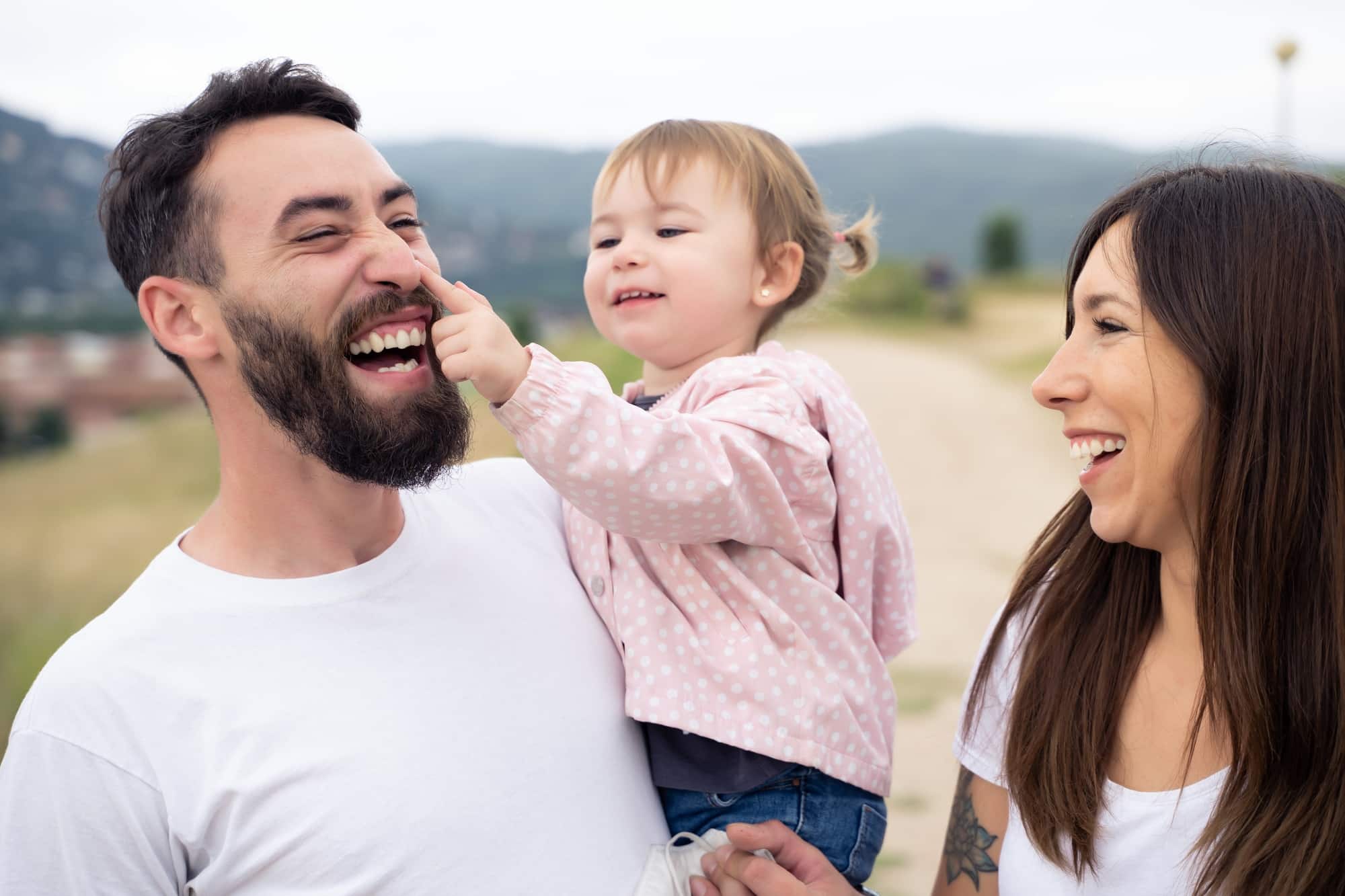 Happy family having fun together outdoors